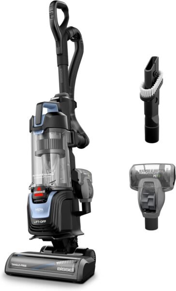 Bissell Pet Hair Eraser Allergen Lift-Off upright vacuum cleaner with HEPA filtration cleaning pet hair from a carpet in a modern living room | bissell vacuum cleaner